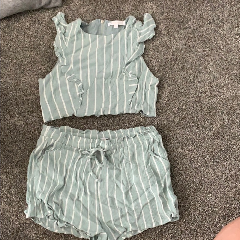 Two piece striped outfit with ruffles